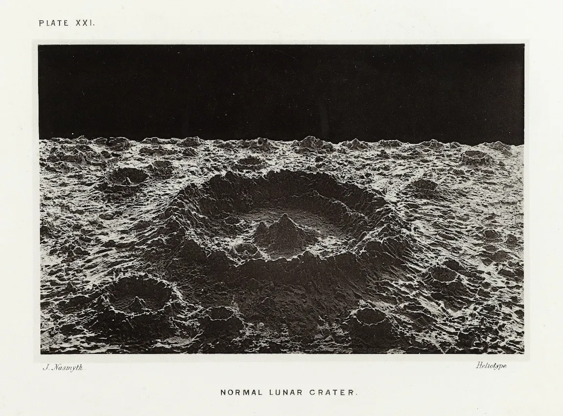 Black and white photograph of a lunar crater